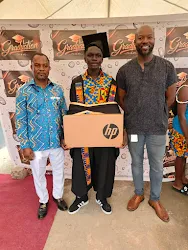 A laptop presentation to Liberty School's top student