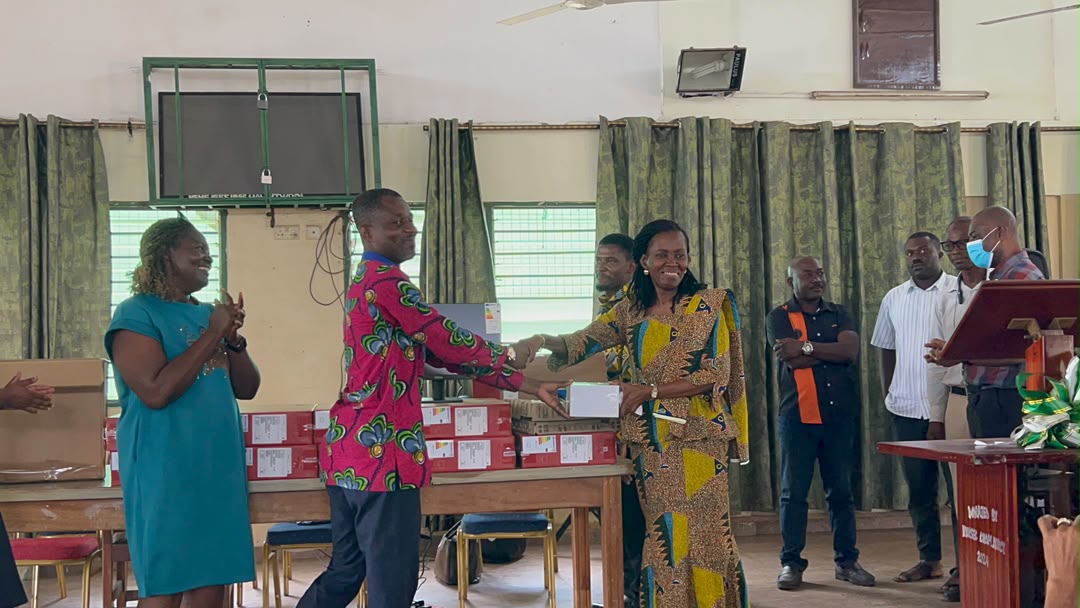 Computer equipment being presented to representatives of Nungua Secondary School